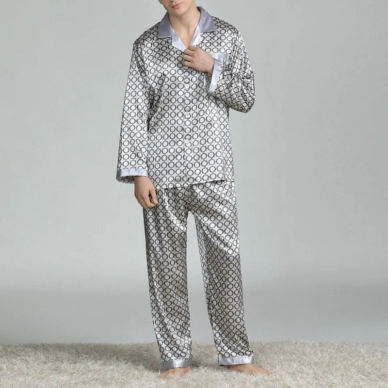 Men's red and blue printed imitation silk pajama suit with lapel collar, long sleeves, and trousers on a model