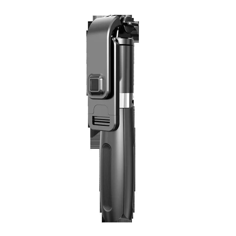 Black and white Bluetooth selfie stick with wireless remote, extended with phone mounted on 360-degree head and tripod base deployed.