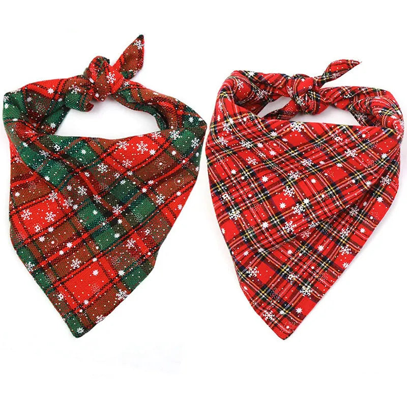 Cotton triangular dog scarf with plaid pattern in Christmas colours, 44x44cm, placed on a dog