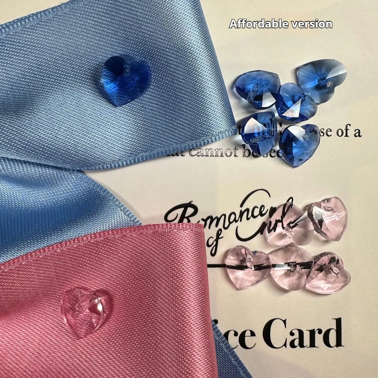 A blue dog hair band with a large princess-style bow and adjustable tension strap on a white background.