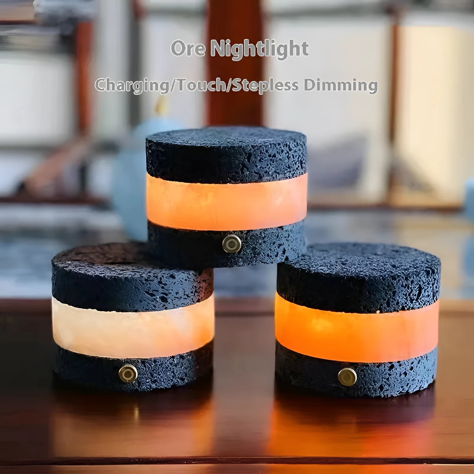 Small orange volcanic rock touch lamp with USB port and essential oil well in warm white.