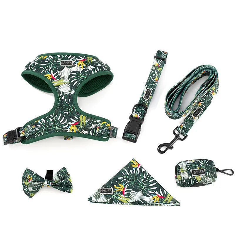 Adjustable cloth pet harness set with six accessories including chest harness, leash, collar, waste bag, bow tie, and triangular scarf