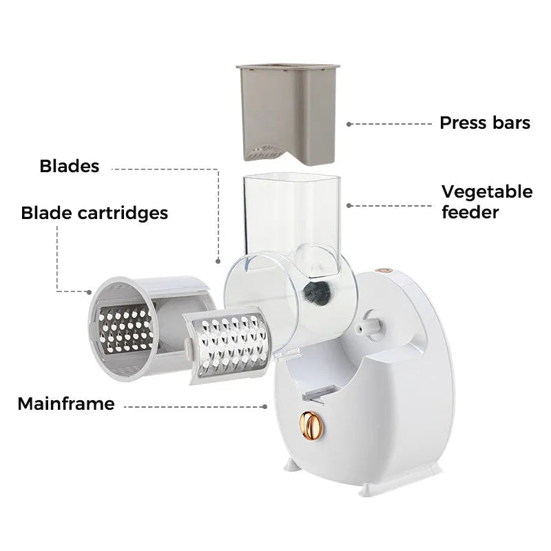 White electric vegetable slicer with suction base and interchangeable blades on kitchen counter