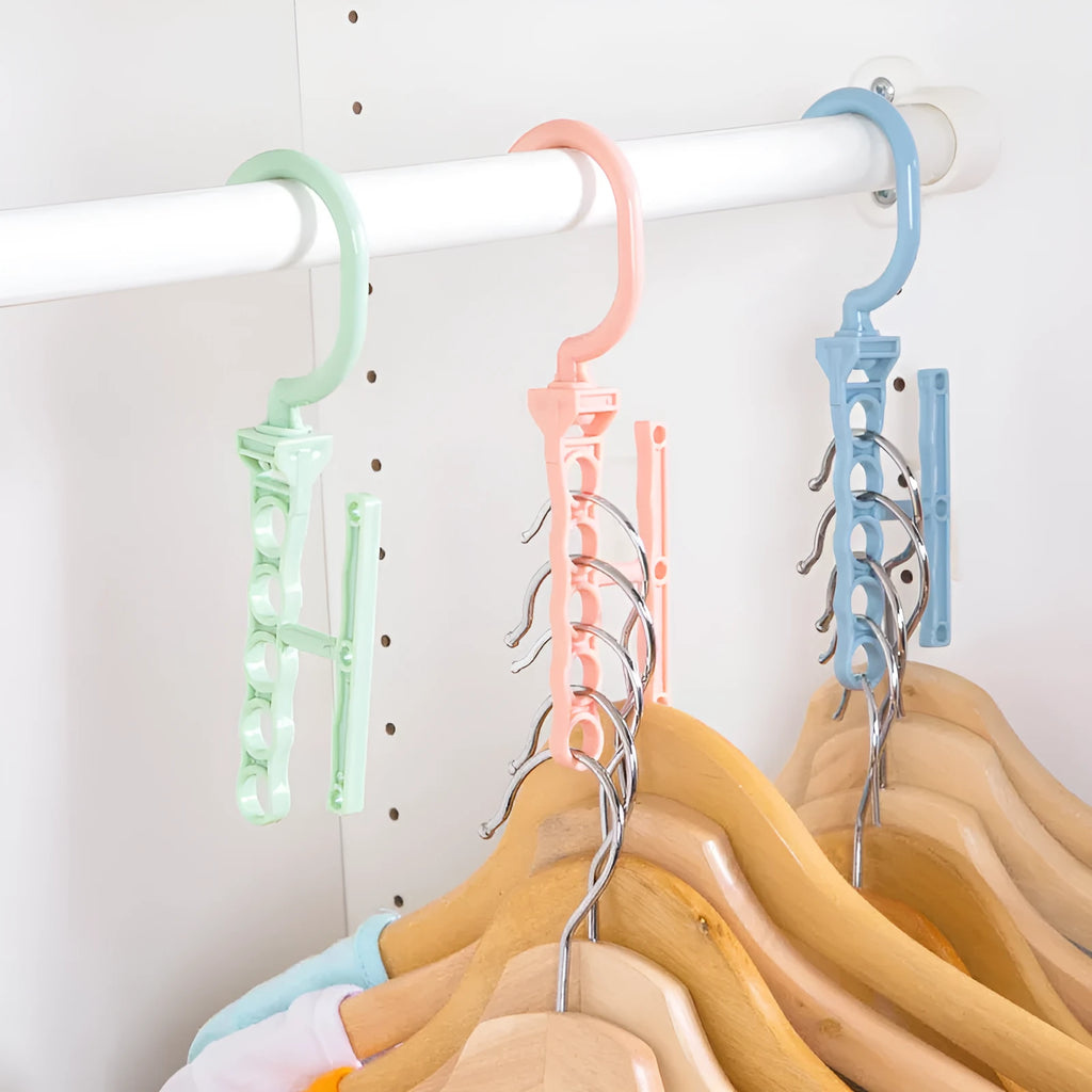Blue revolving wardrobe hanger with five arms and a central handle for space-saving clothes storage.