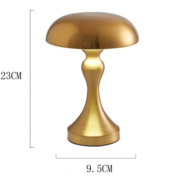 Bronze metallic touch-control LED desk lamp showing three light colour settings on a desk