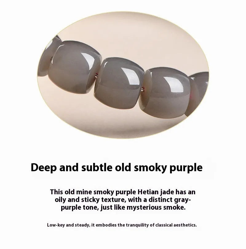 Natural Smokey Violet Hetian jade straight cut bracelet with geometric beads on a wrist.