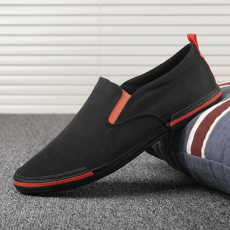 Men's low-top canvas casual shoes in grey colour with vulcanised rubber sole and round-toe design