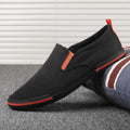 Men's low-top canvas casual shoes in grey colour with vulcanised rubber sole and round-toe design