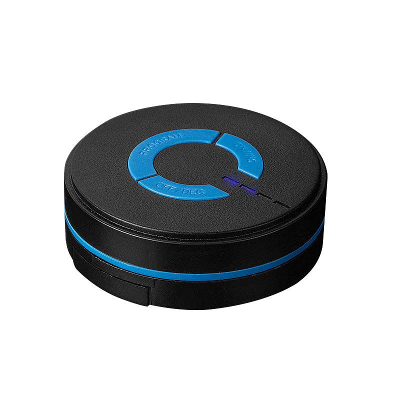 Black mini electric shoulder and neck massager with massage patch next to its 15cm long packaging.