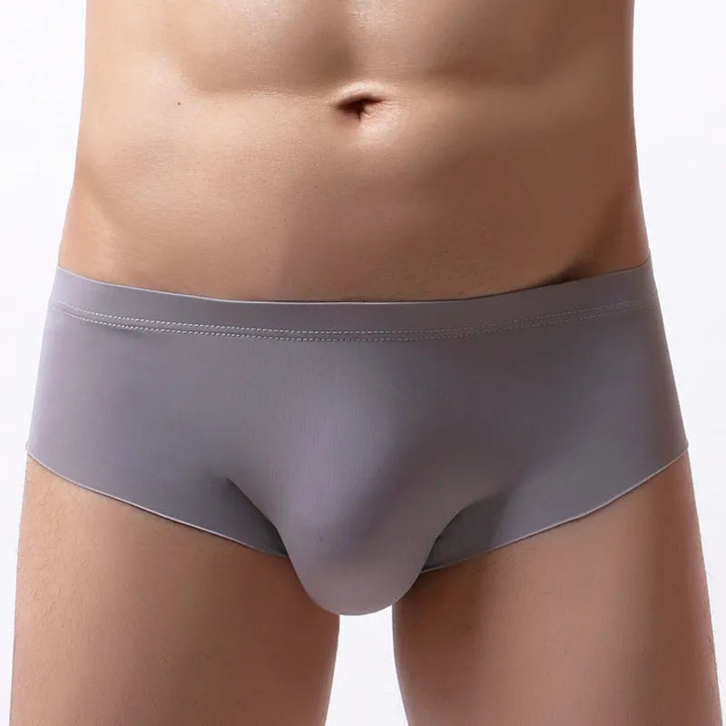 Men's seamless ice silk underwear, thin mid-waist brief, 92% nylon, plain pattern, available in 8 colours and sizes S-XL.