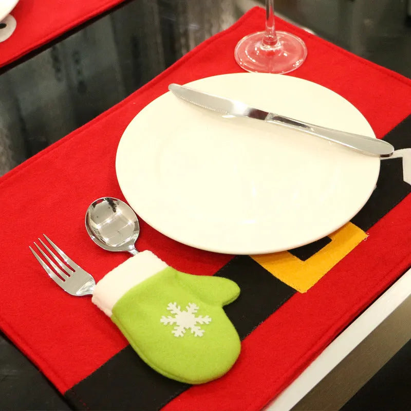 Red brushed fabric Christmas table mat measuring 45cm by 33cm on a dining table