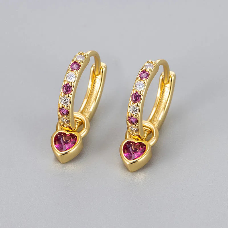 Women's zircon heart drop earrings with coloured stone in gold or white gold colour setting.