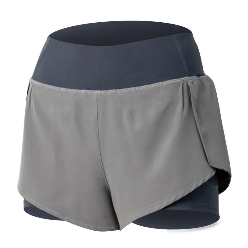 2-in-1 active shorts in Light Blue, polyester fibre, size M, flat lay view showing outer short and built-in liner