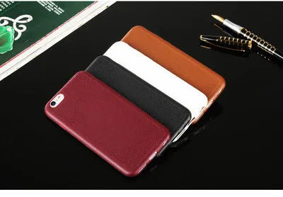 Leather iPhone case with TPU protection in Black, Brown, Navy Blue, and Wine Red colours