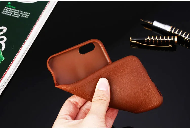 Leather iPhone case with TPU protection in Black, Brown, Navy Blue, and Wine Red colours