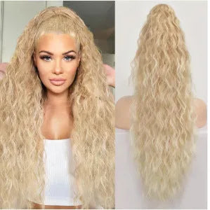 Long, fluffy curly synthetic ponytail wig in a high temperature fibre, shown in a 30-inch length.