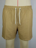 Men's navy blue striped polyester shorts with a straight leg and triangle lining, laid flat.
