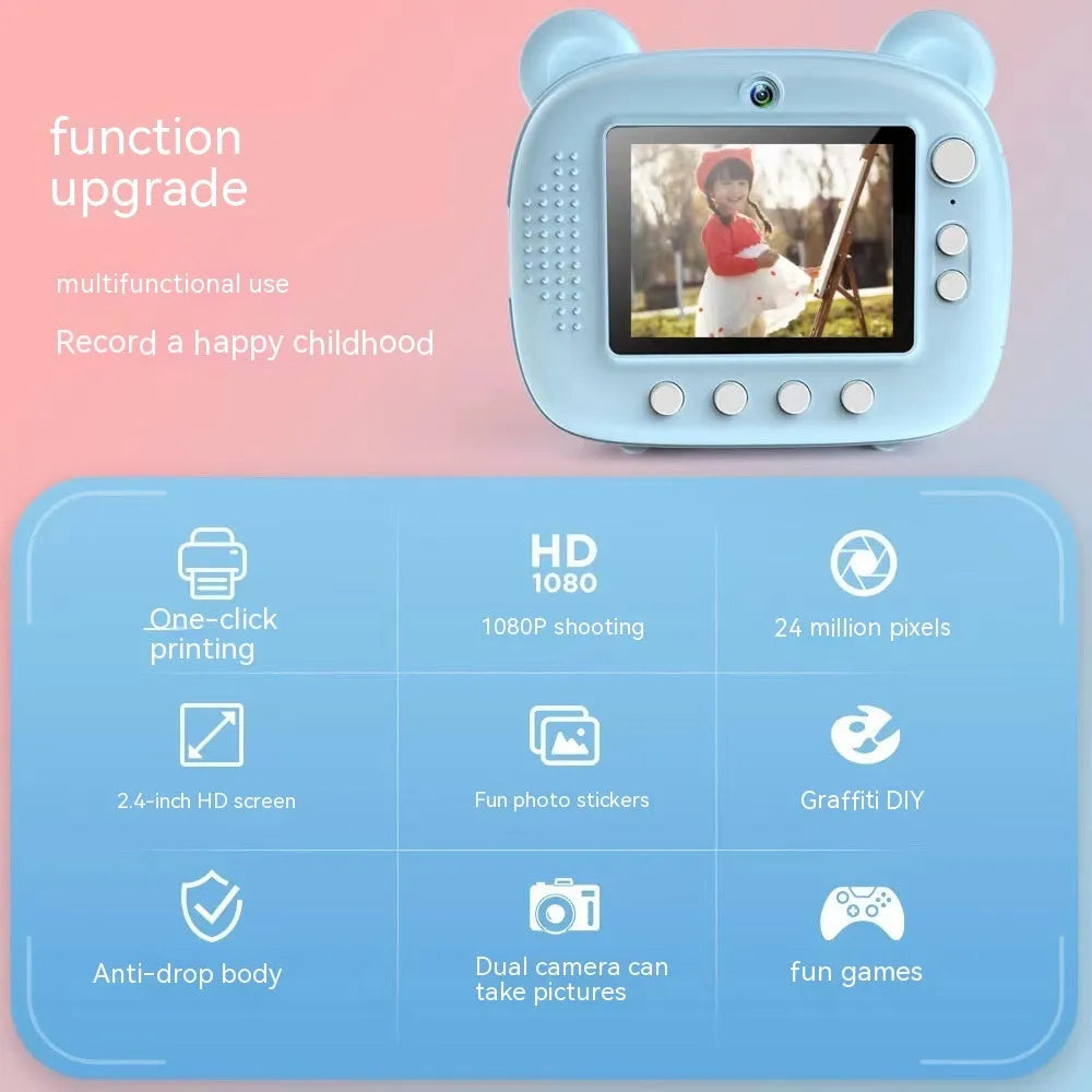 Pink children's printing camera with HD dual lenses, lanyard, and crayons on white background