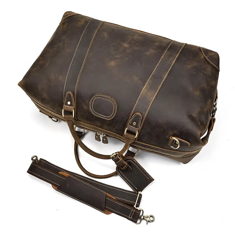 Genuine cowhide leather large capacity luggage bag in light brown with zipper closure and top handles