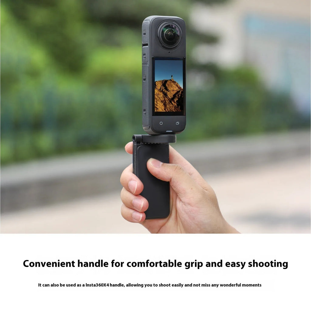 Black magnetic bracket base and handle accessory for Insta360 X4 camera on a desktop