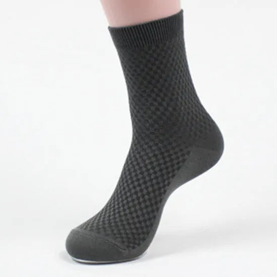 Men's bamboo fibre business socks in a small square pattern, shown in navy blue colour.