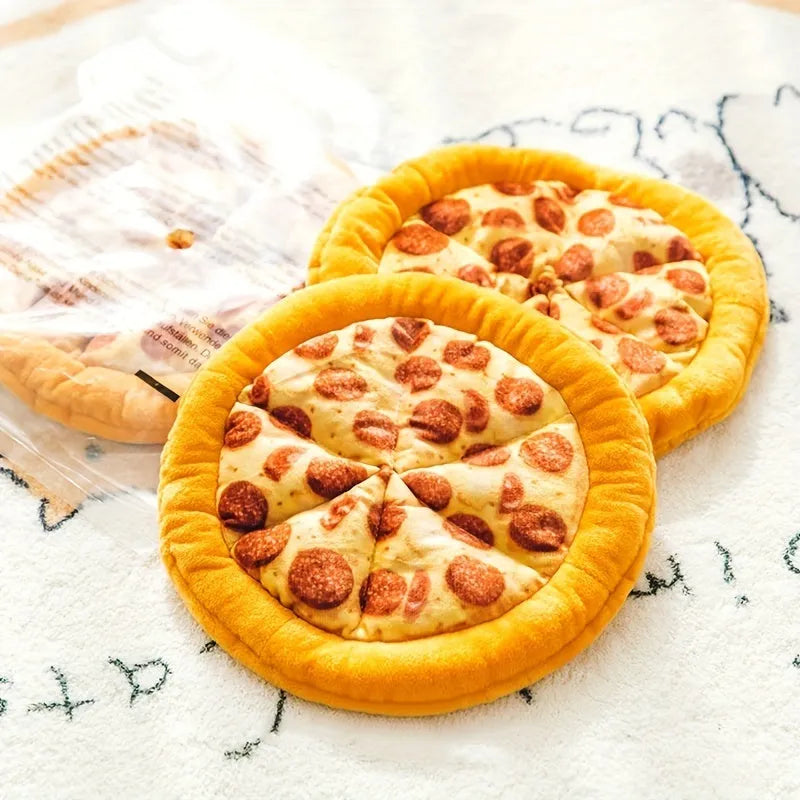 Yellow pizza slice plush dog chew toy with textured grinding surface