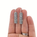 Long silver geometric earrings with carved vine design and retro European American style