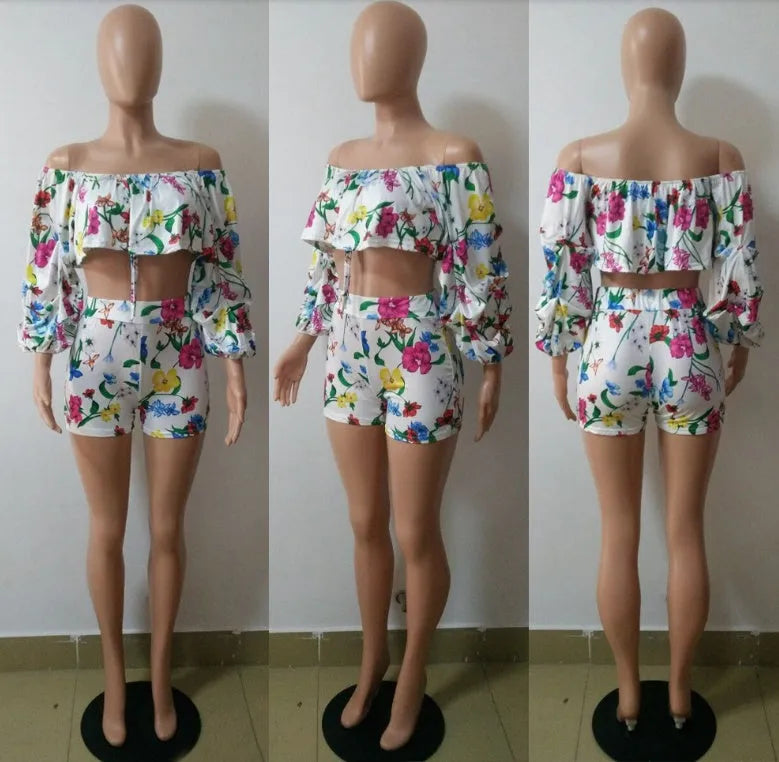 Women's multicolour digital print two-piece suit with a pile sleeve jacket and matching shorts.