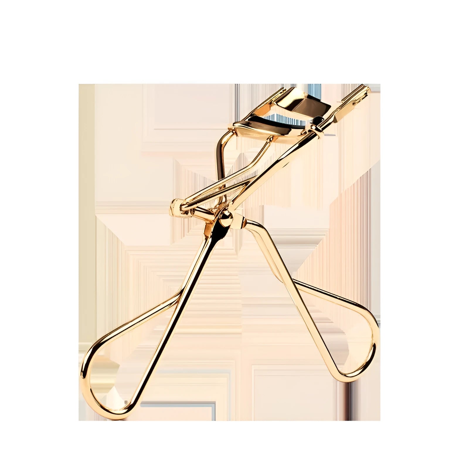 Beland Eyelash Curler G2 golden finish facial beauty tool on a white background