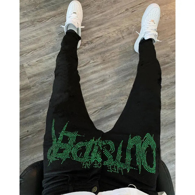 Men's black ripped jeans with stretch denim, regular fit, 70% cotton 30% polyester blend