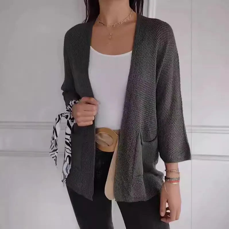 Women's waffle texture cardigan coat with nine-quarter sleeves in army green colour showing side pockets