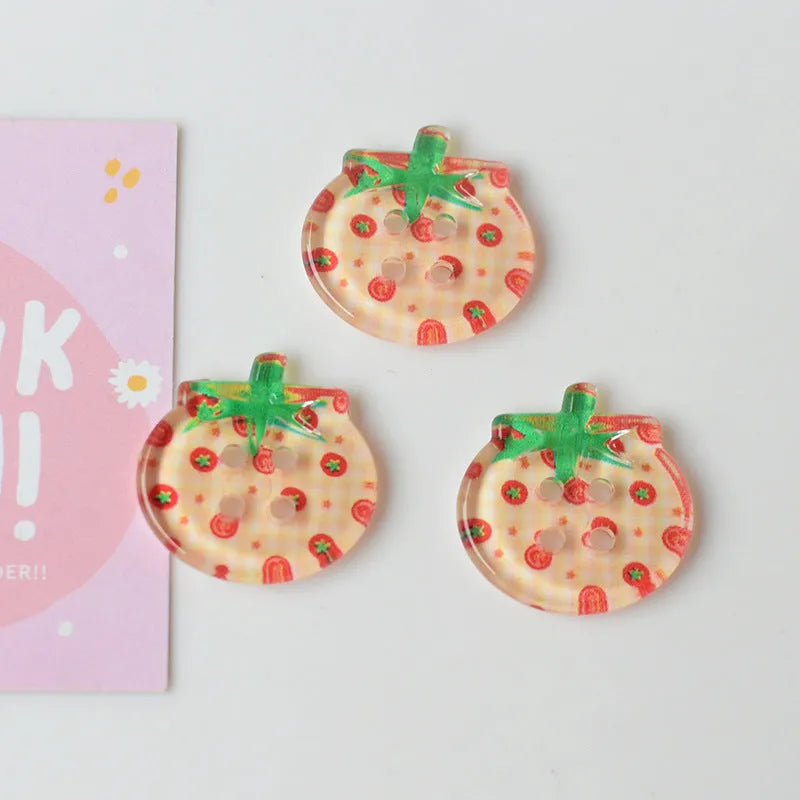 Medium tomato-themed plastic buttons in red colour variations including cherry tomato printing and solid red