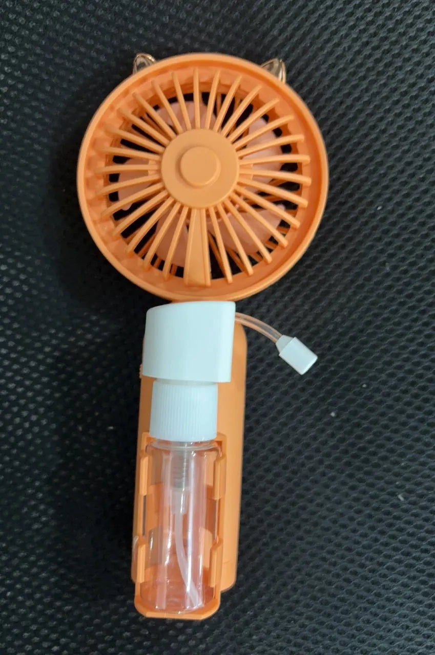 Compact plastic USB personal fan in a choice of five colours: apricot, blue, green, orange, or pink.