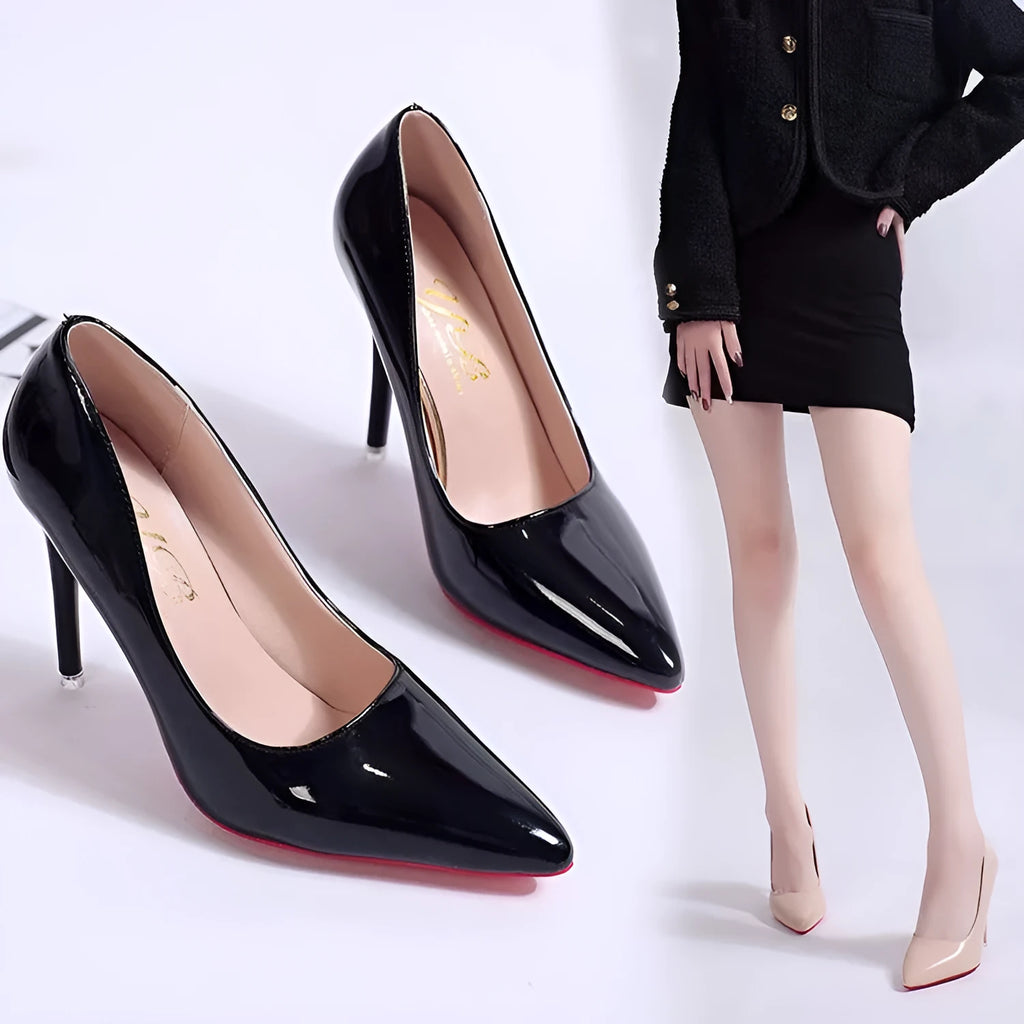 Women's black pointed toe stiletto pumps with a shallow mouth design on a white background.