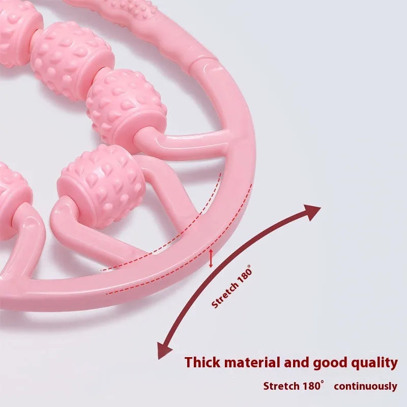 A pink manual leg massager roller with twelve wheels and black ring clips for securing to the leg.
