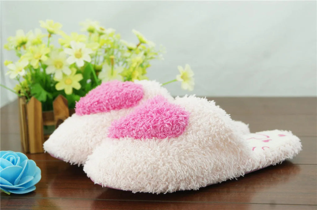 Non-slip plush cotton slippers with suede upper and TPR sole in pink, purple, and white