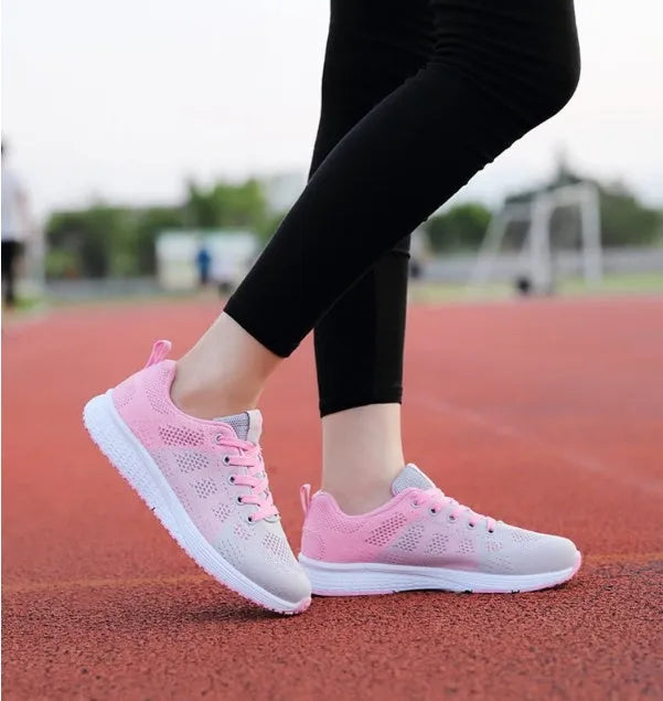 Women's breathable mesh flat heel sports shoes available in black, pink, and rose red colours
