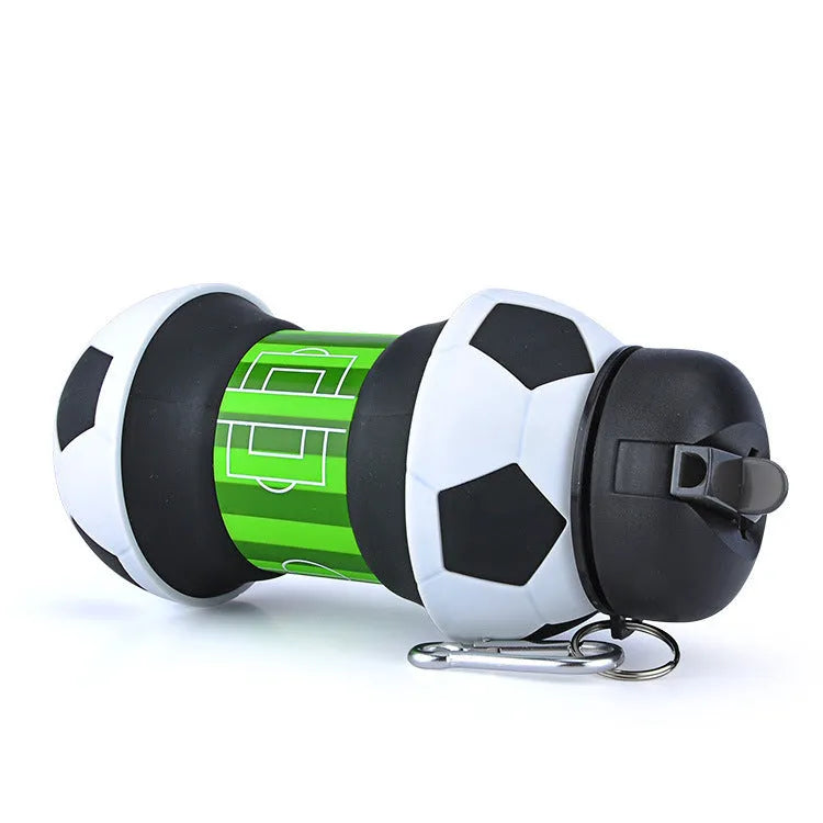 White collapsible silicone soccer water bottle with straw and carrying clip on white background