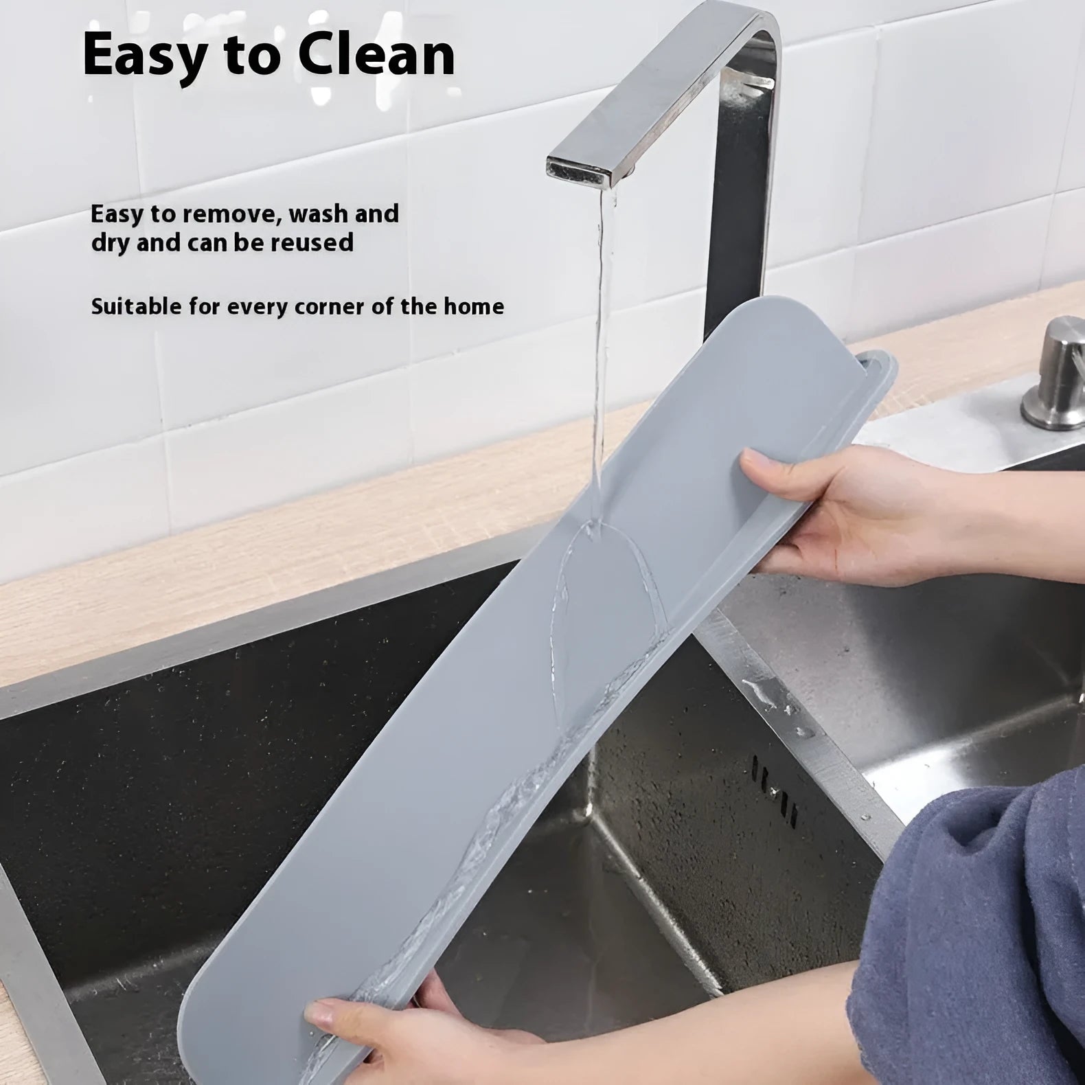 Thick silicone kitchen sink water blocking plate splash guard in grey colour showing 52mm width and 85mm length