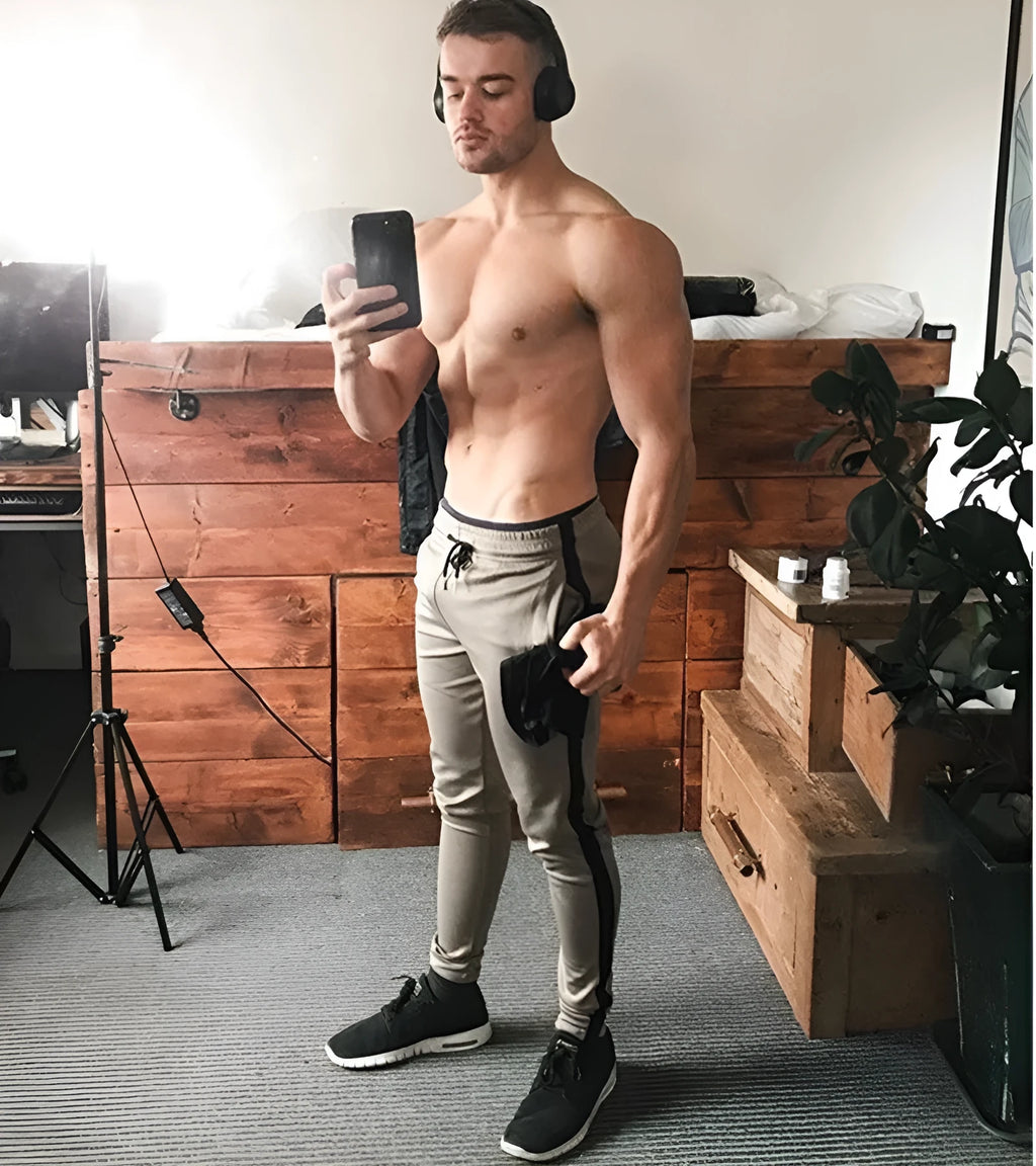 Sports cropped pants in polyester fibre, available in multiple colours including black red and khaki, sized L to XXL.