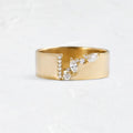 Gold electroplated copper ring with shining zircon stone showing front view