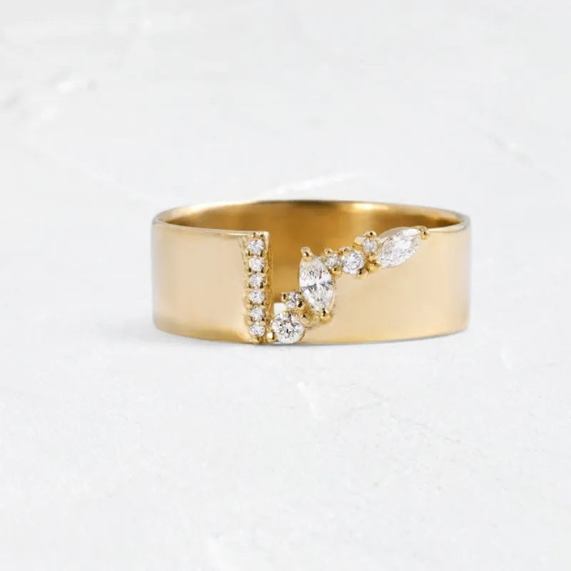 Gold electroplated copper ring with shining zircon stone showing front view