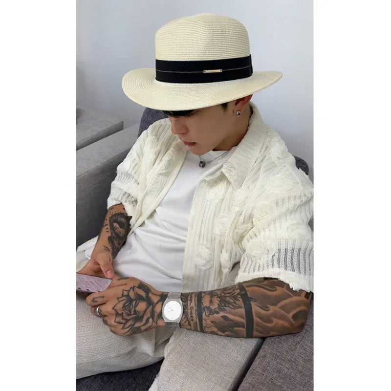 Man's loose-fit short-sleeve shirt with a white and black three-dimensional floral print on heavyweight fabric.