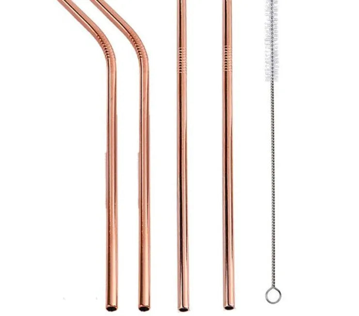 Set of four colourful reusable stainless steel straws in straight and bent styles with a cleaning brush.