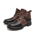 Men's brown Martin booties with side zipper and rubber sole on white background