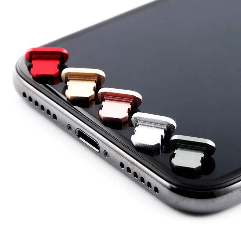 Aluminium alloy dust plug for iPhone charging port in various colours.