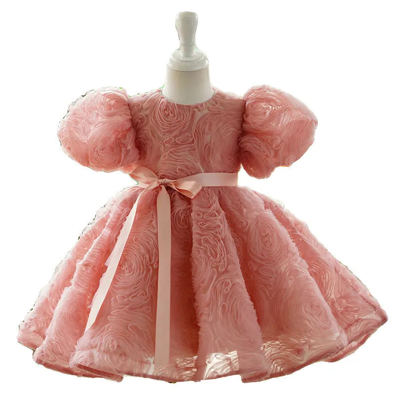 Children's girls birthday pettiskirt in bean pink with layered polyester design, front view