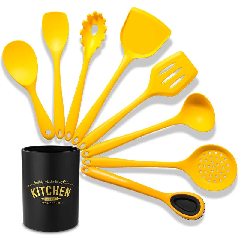 Yellow silicone and nylon 4-piece cooking utensil set with spoon and spatula for nonstick cookware