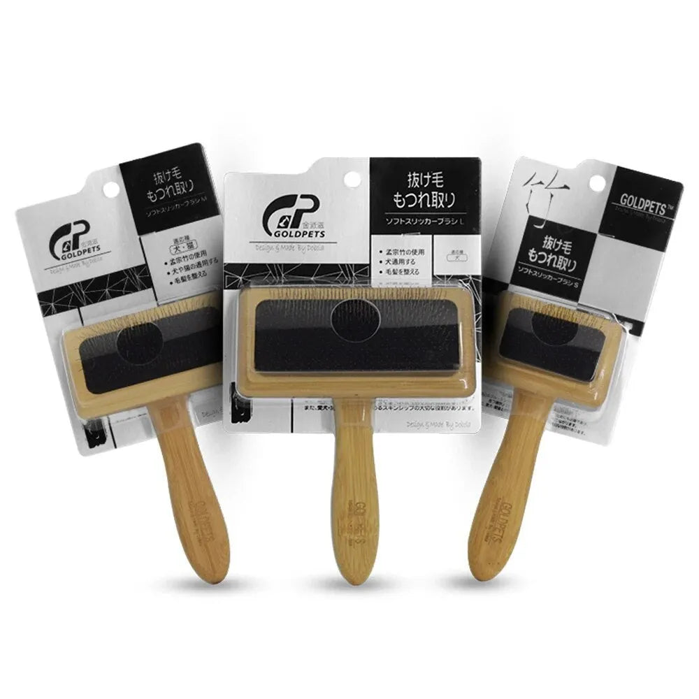 Goldpets bamboo and wood slicker brush for grooming cats and dogs with long prongs.