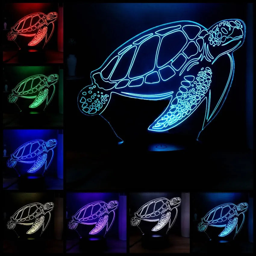 3D acrylic turtle shaped LED night light showing multi-coloured illumination on a shelf.
